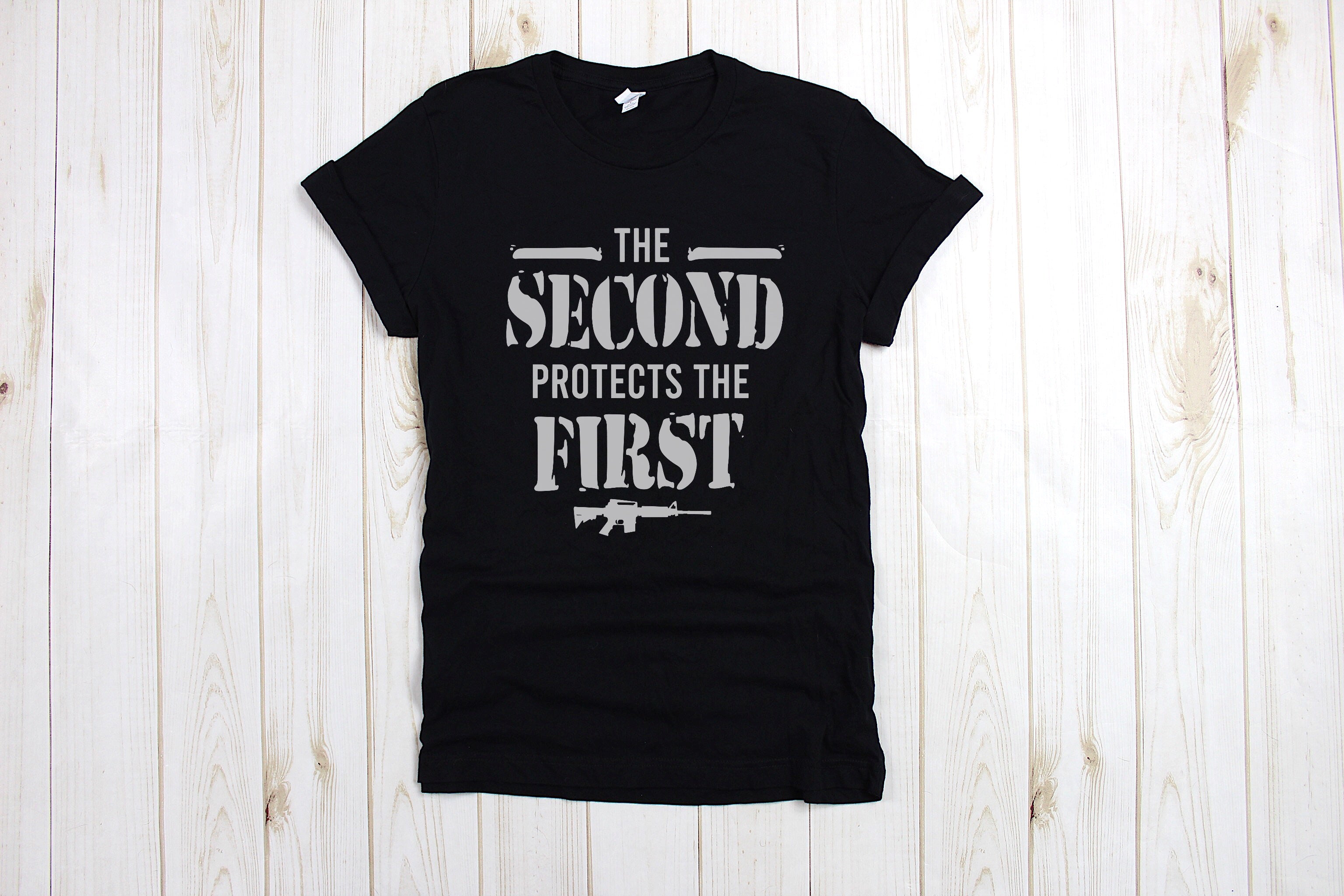 The Second protects the First unisex tee