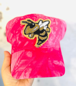 Buzz patch on distressed baseball cap ponytail