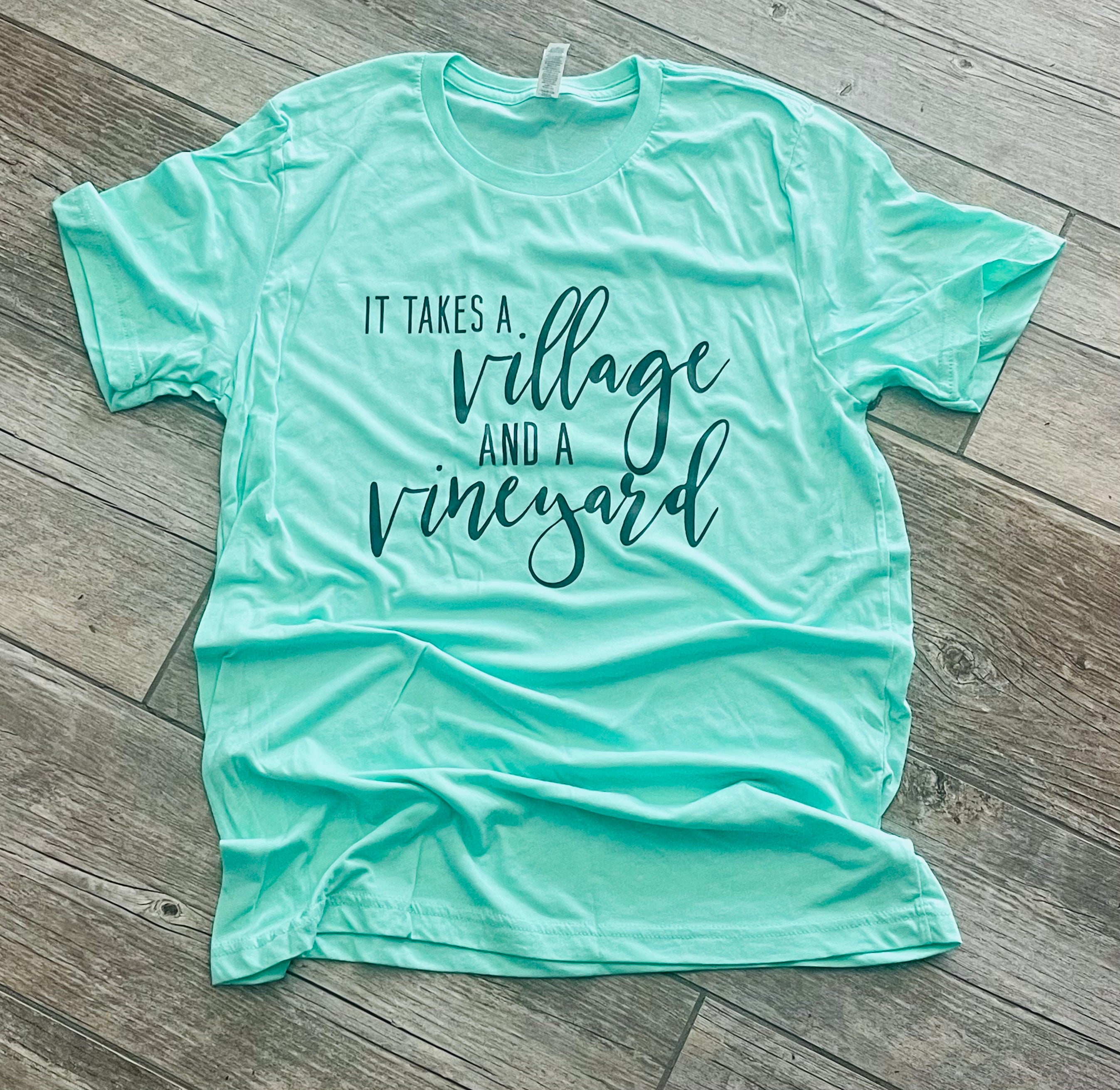 It takes a Village and a Vineyard unisex tee