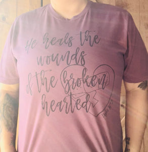 He heals the wounds of the broken hearted unisex Next Level tee