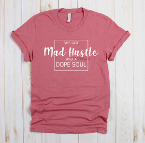 She got Mad Hustle and a Dope Soul tee